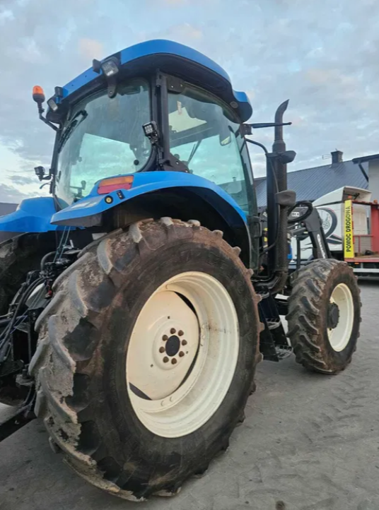 Ciągnik New Holland TS 100A z ładowaczem Quicke Q30 - Ciągnik - foto 3