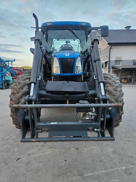 Ciągnik New Holland TS 100A z ładowaczem Quicke Q30 - Ciągnik - foto 5